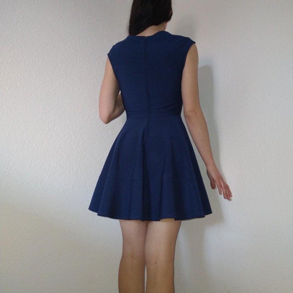 Most Wanted: Eyelet Mini Circle Skirt in Black with Red Bows